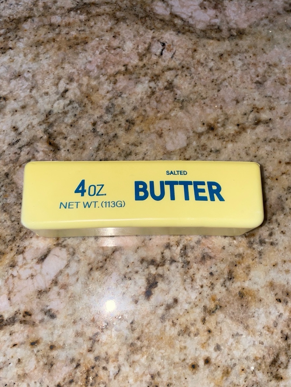 Butter Yellow Stick Squishy with Bold Blue Text